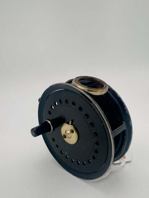 Vintage J.W. Young-Sons 3.5 fishing reel with black finish and brass details, perfect for collectors and anglers.