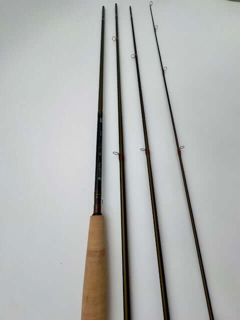 Hardy Marksman 10' 4wt fishing rod with four sections, featuring a lightweight design and sensitive tip for precise angling.