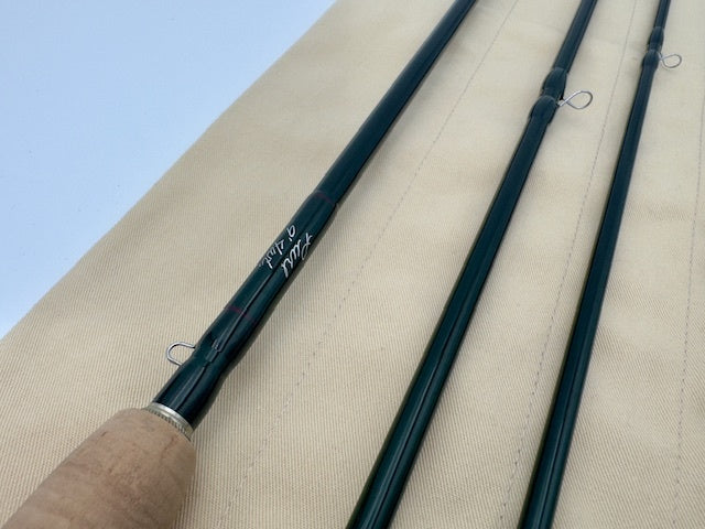 Winston Pure 9' 4wt fishing rod showing medium-flex design for precision casting in rivers and streams.