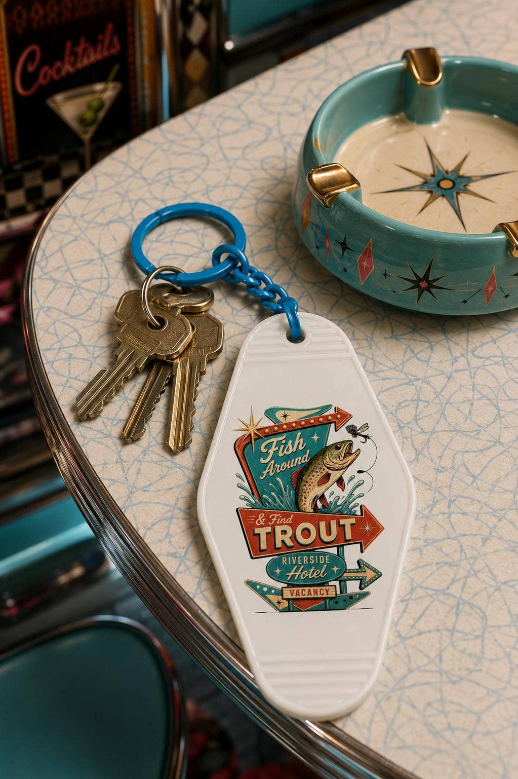 Fish Around & Find Trout Motel Keychain
